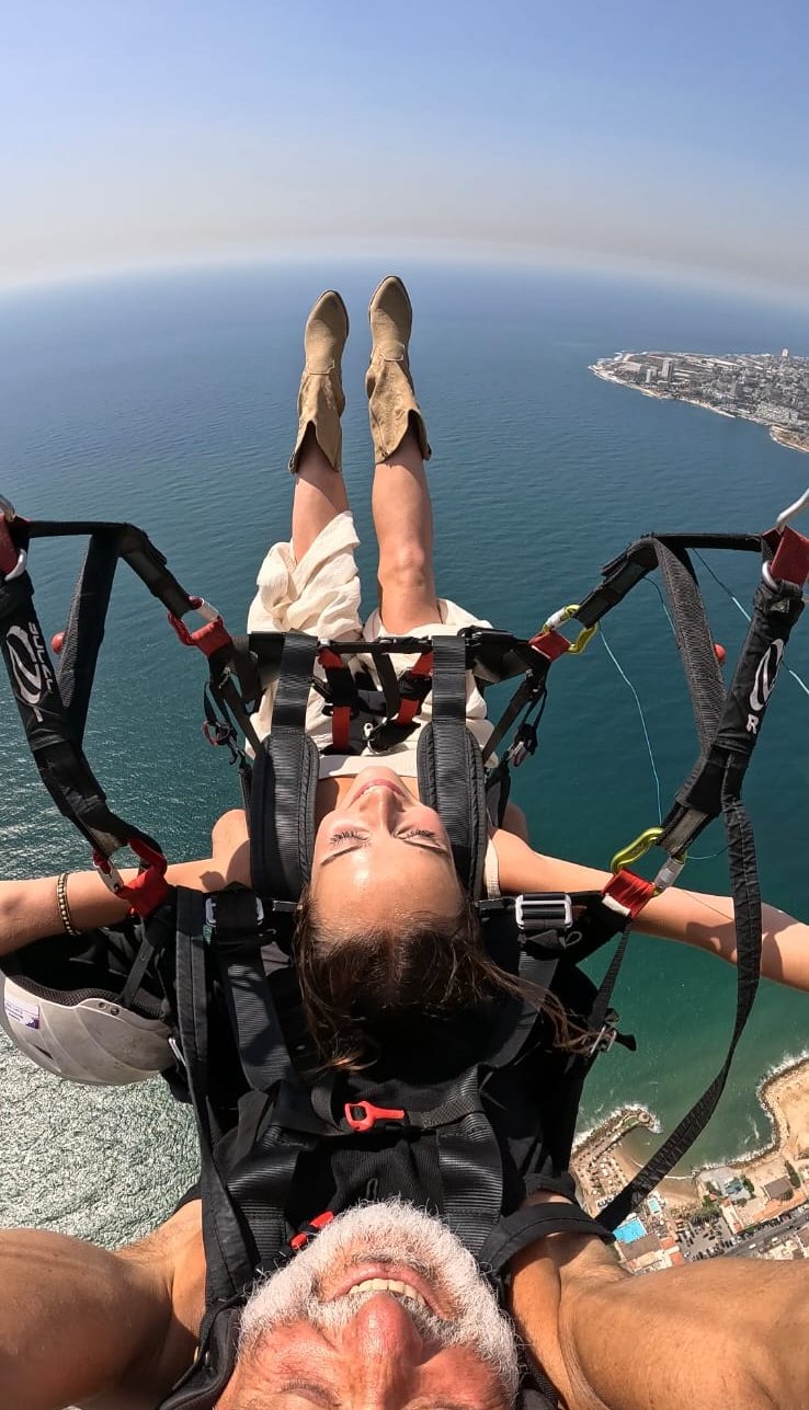 Top-down view of a passenger flying above the Mediterranean near Jounieh