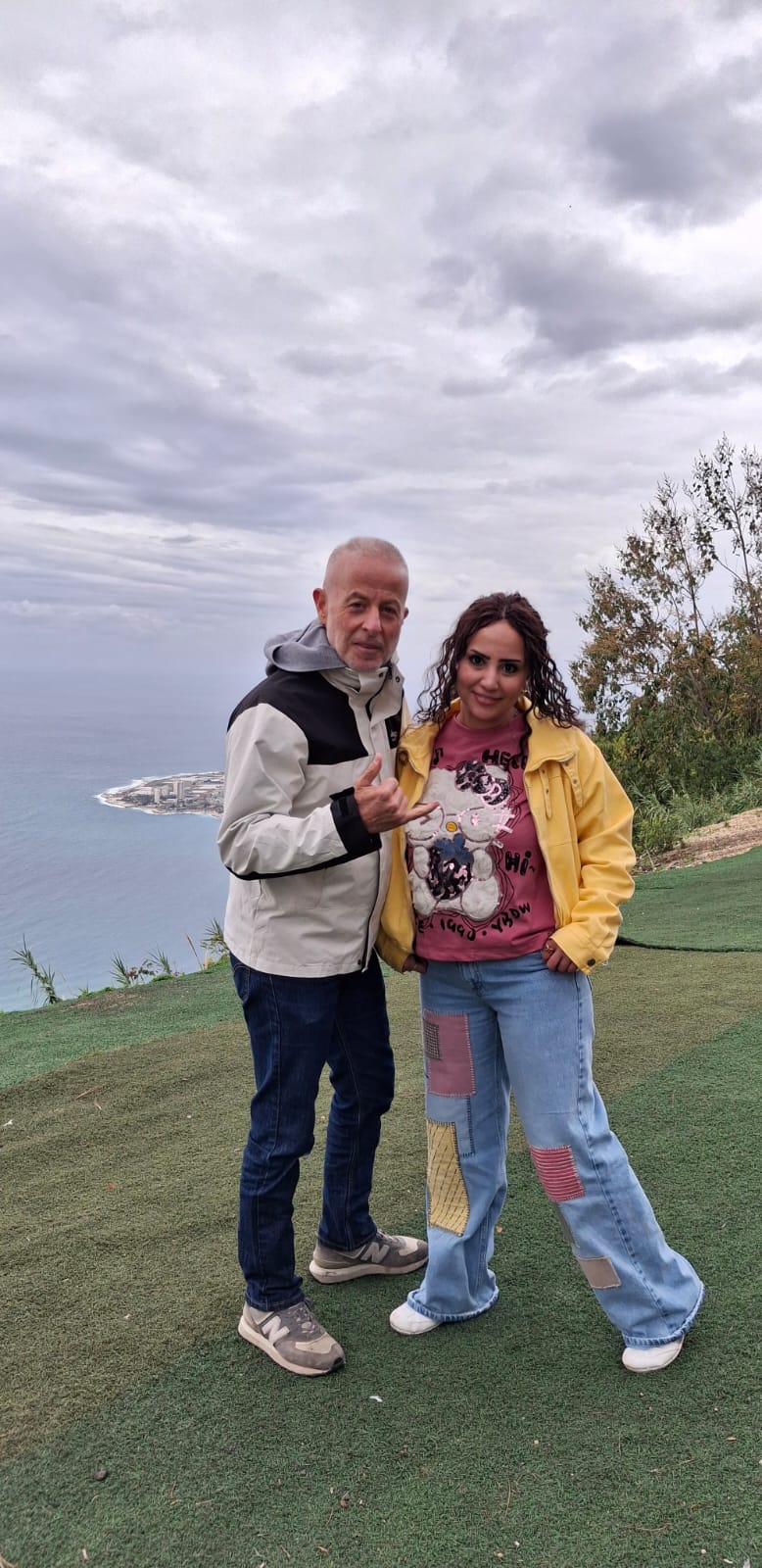 Pilot and passenger at the Harissa launch site overlooking the Mediterranean